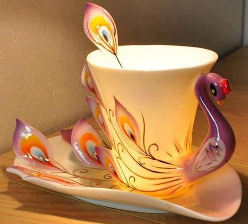 Peacock-themed Cup and Saucer — White