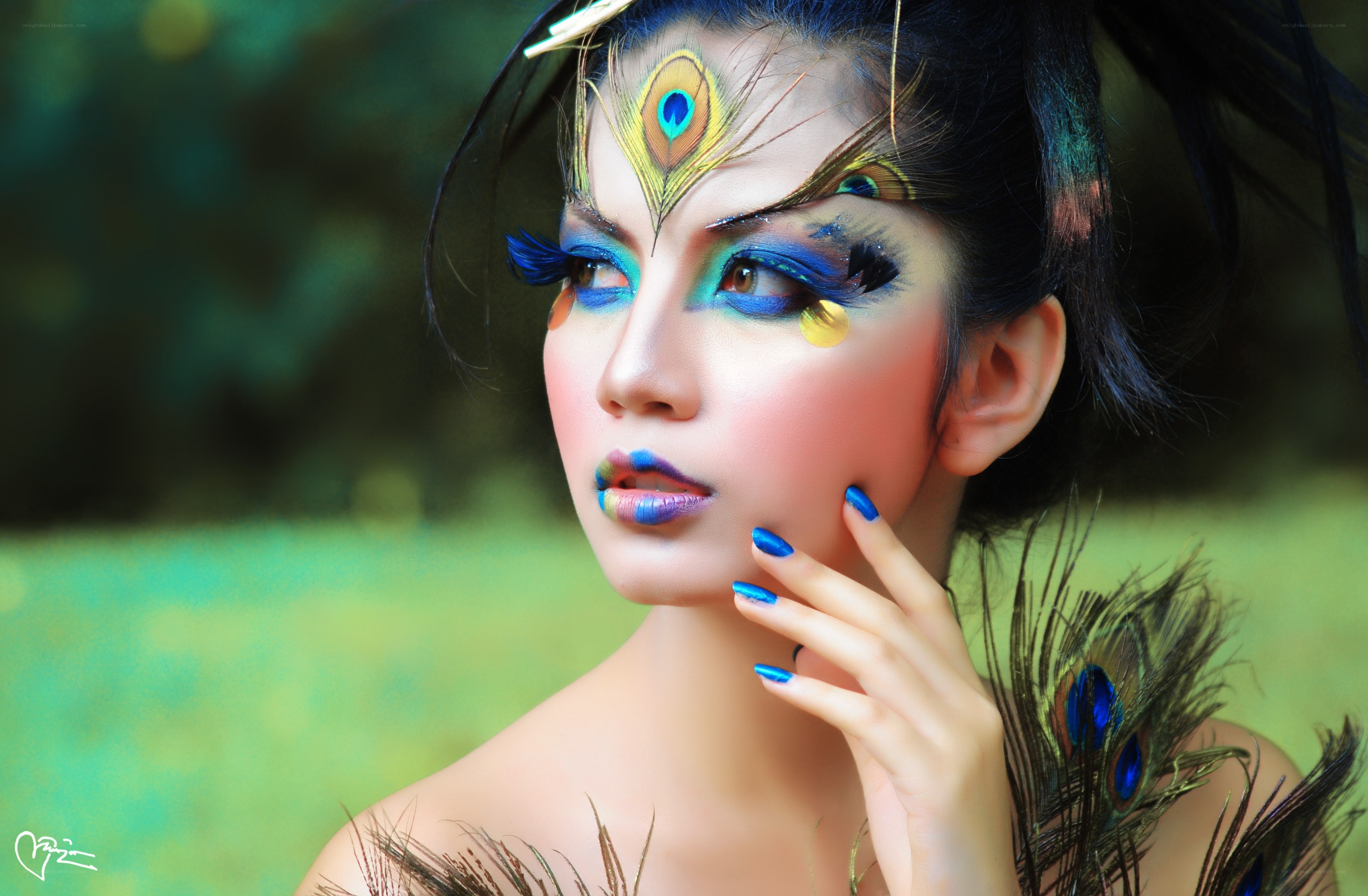 peacock-themed makeup portrait