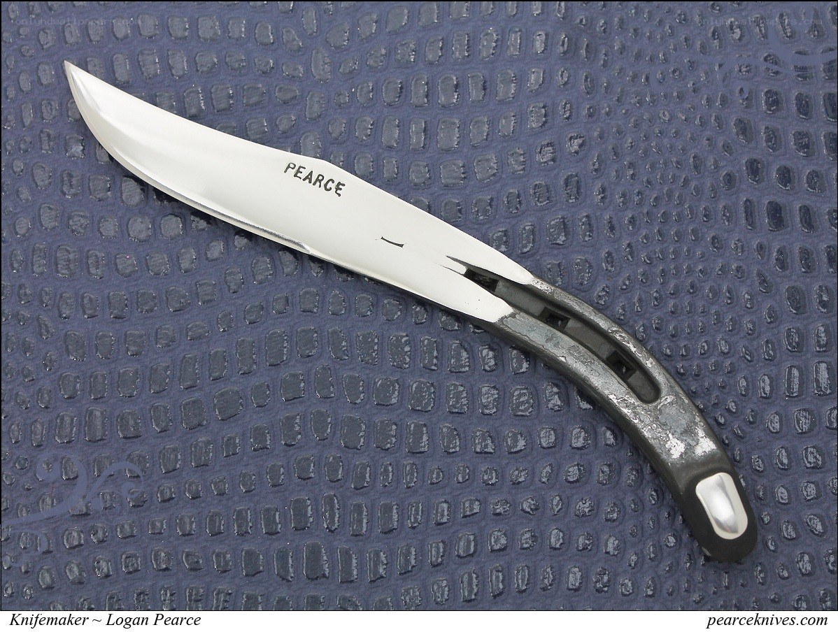 Pearce knife on textured surface