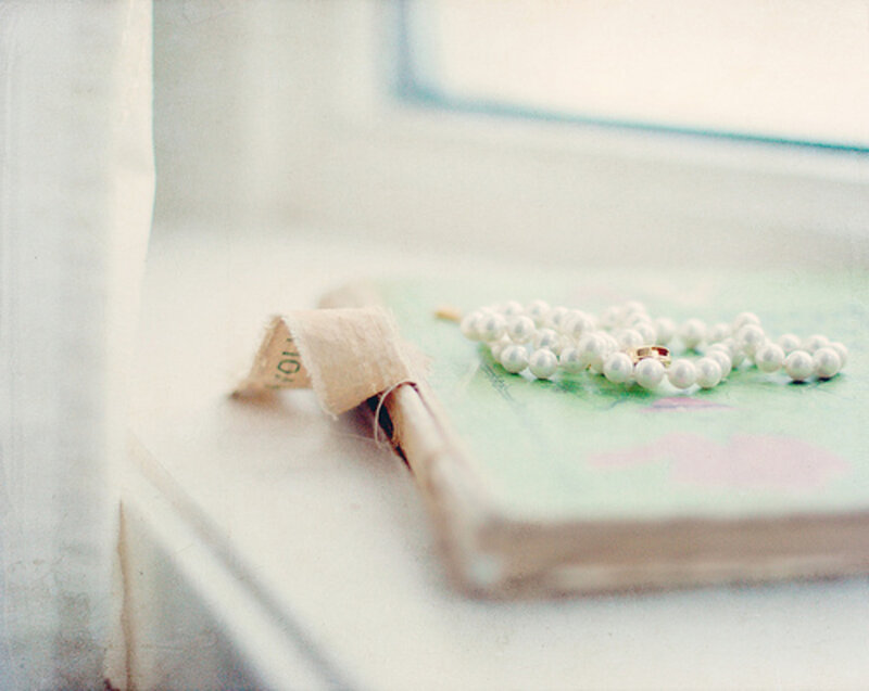 Pearl Necklace on Book — White