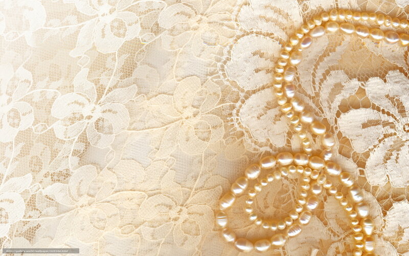pearl necklace on lace fabric