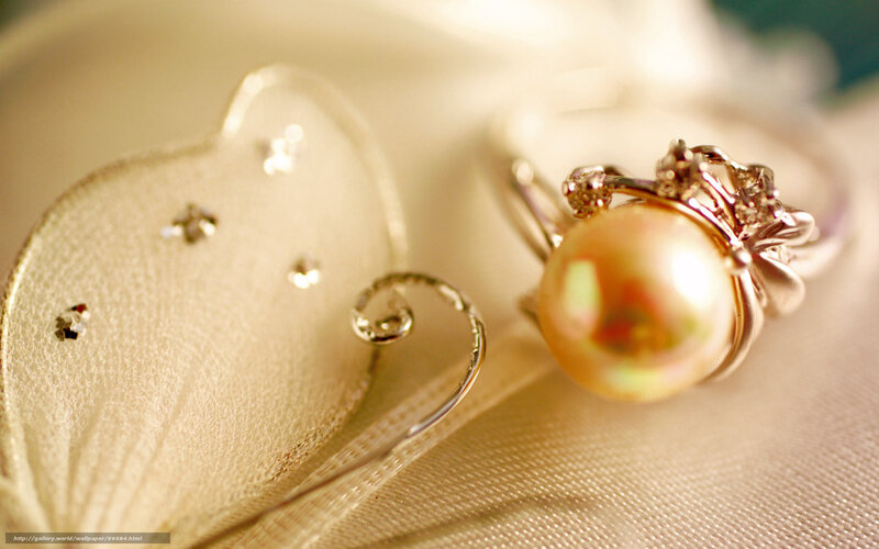 Pearl ring on fabric