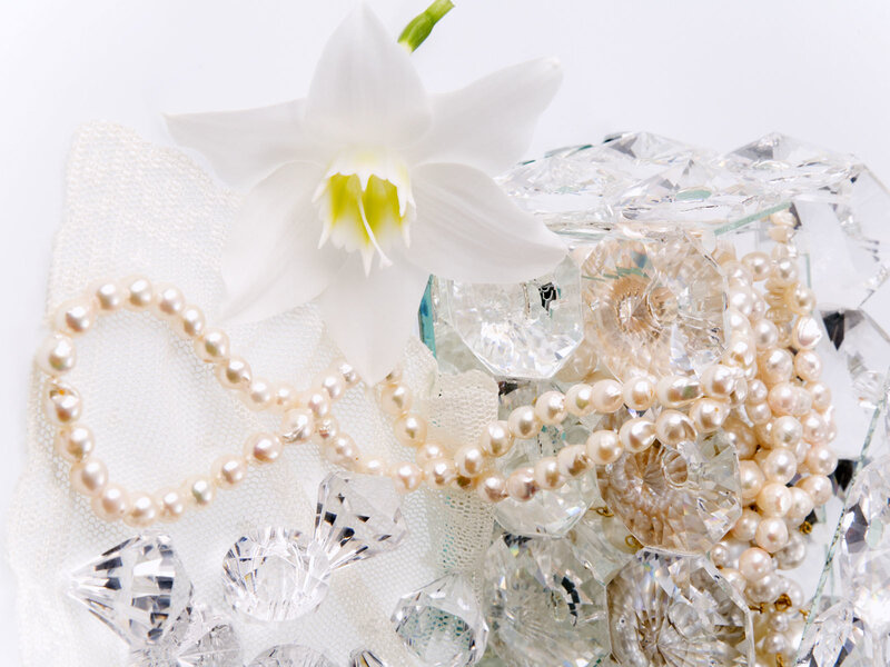 pearls and crystals with white flower