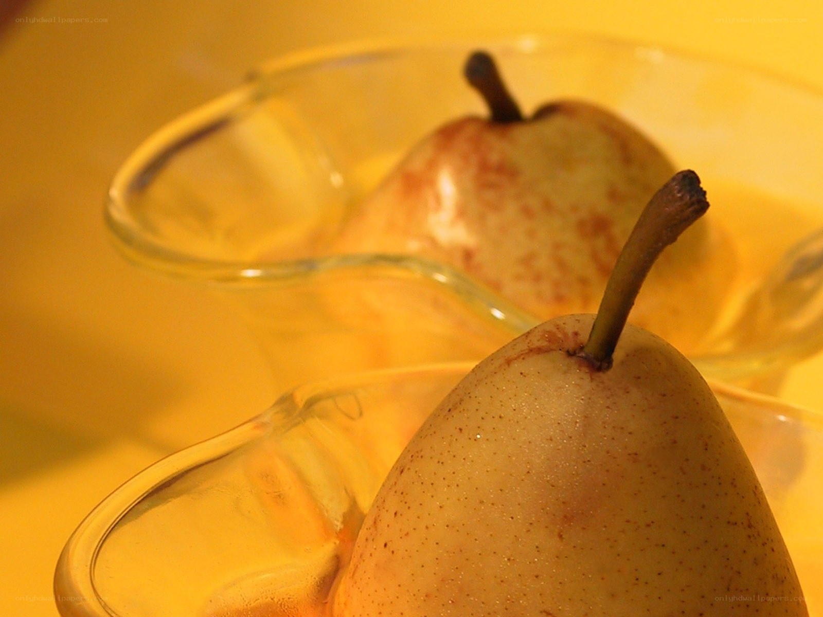 Pears in glass bowls