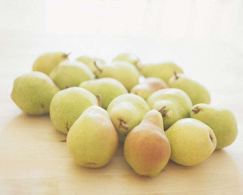 Pears on a wooden surface