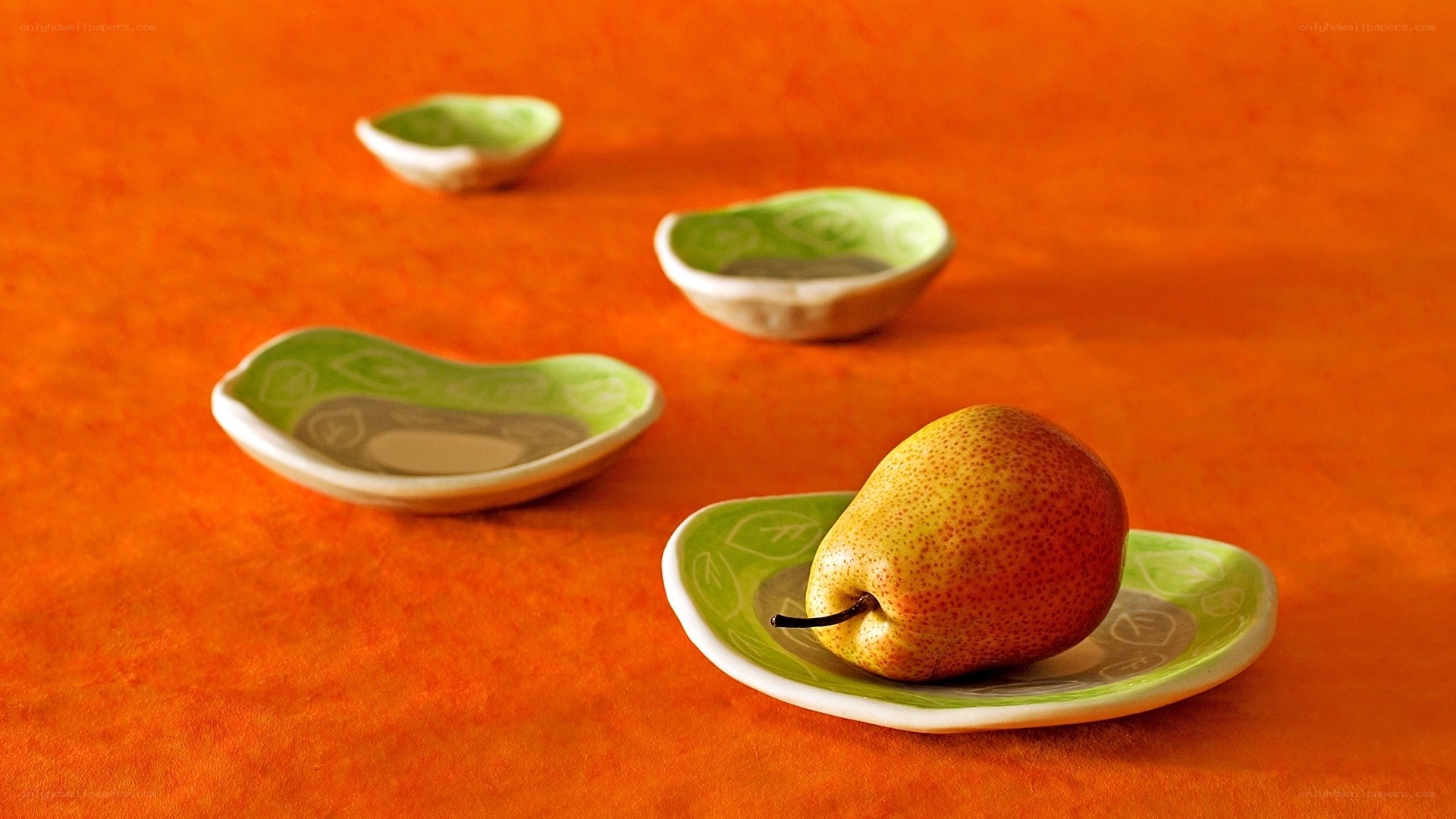 Pears on green plates