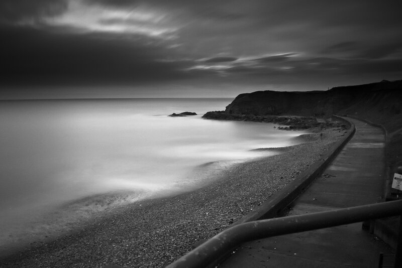 Pebble Beach at Dusk — Black, Dramatic