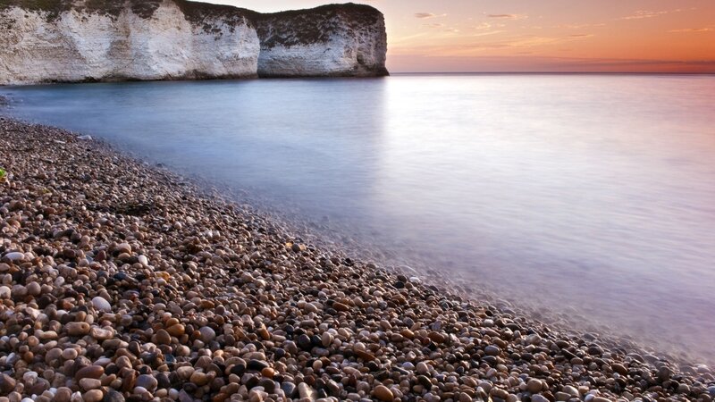 Pebble Beach at Sunset — Blue, Serene, Photograph, Cliffs, Sea