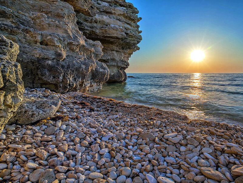 Pebble Beach at Sunset — Blue, Serene, Photograph, Cliffs