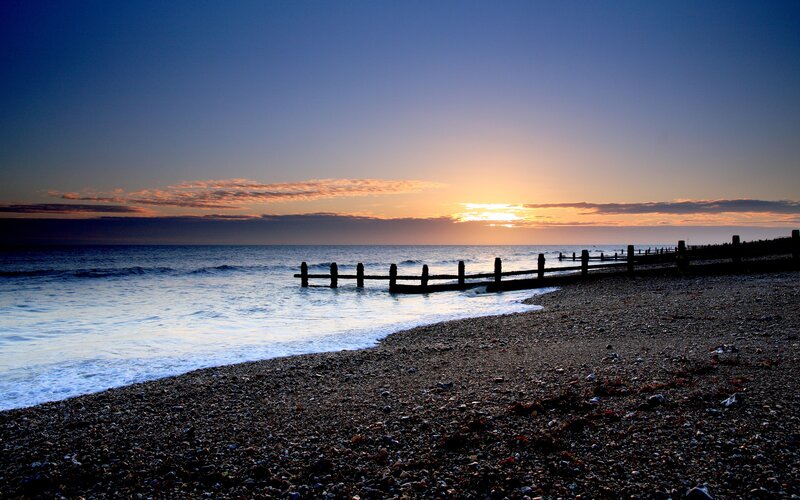 Pebble Beach at Sunset — Blue, Serene, Photograph, Ocean, Sun