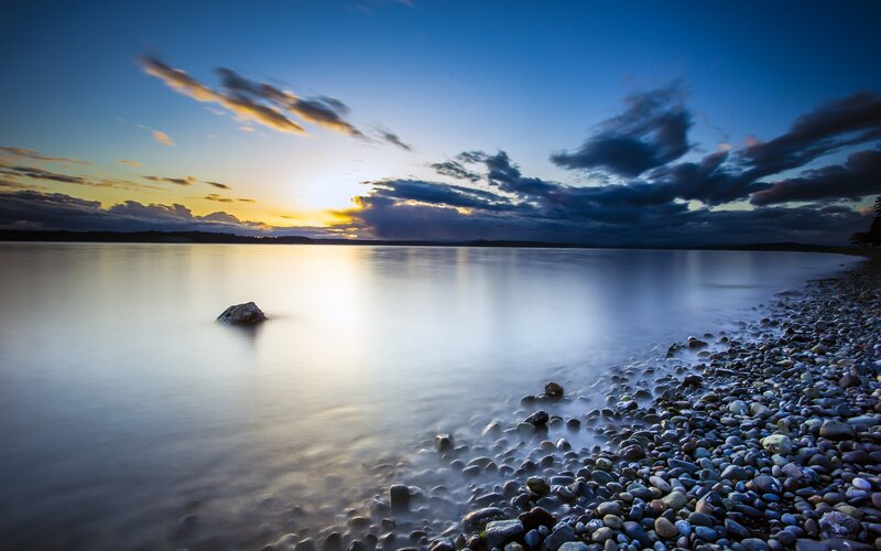 Pebble Beach at Sunset — Blue, Serene, Photograph, Sky, Clouds