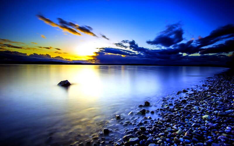 Pebble Beach at Sunset — Blue, Serene, Photograph, Sun