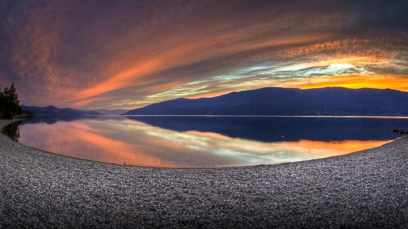 Pebble Beach at Sunset — Orange, Dramatic, Photograph, Mountains