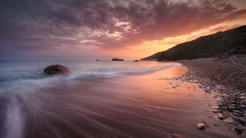 Pebble Beach at Sunset — Orange, Serene, Photograph, Ocean, Rocks