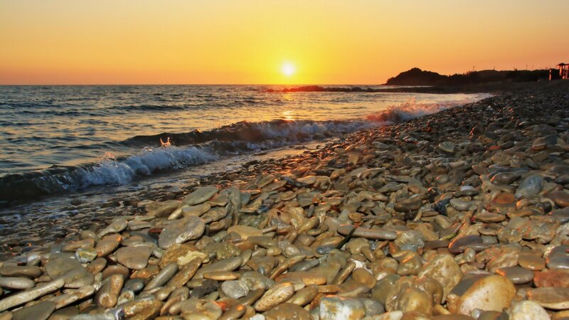 Pebble Beach at Sunset — Orange, Serene, Photograph, Ocean