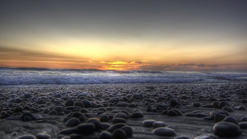 Pebble Beach at Sunset — Orange, Serene, Photograph, Ocean, Waves