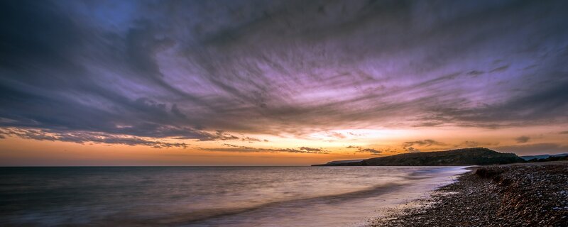 Pebble Beach at Sunset — Purple, Dramatic, Photograph, Ocean, Sky, Hill