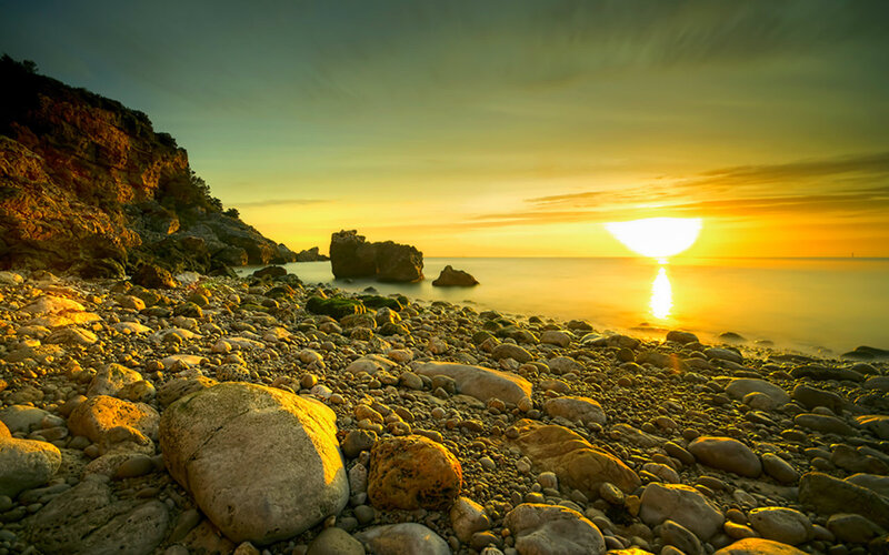 Pebble Beach at Sunset — Yellow, Serene, Photograph, Sun