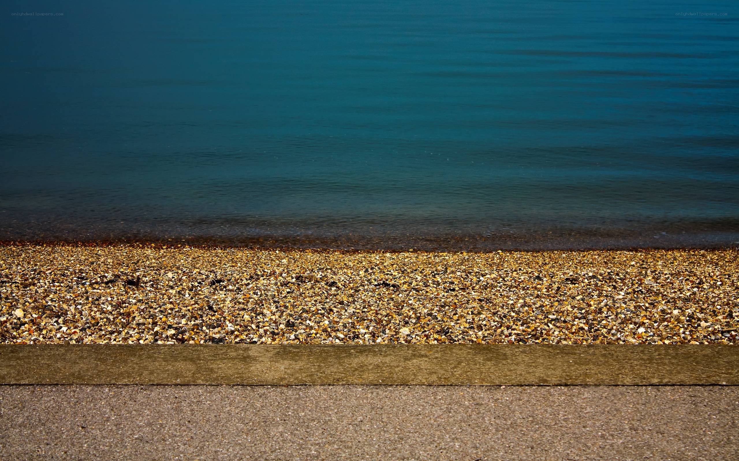 pebble beach at the water's edge