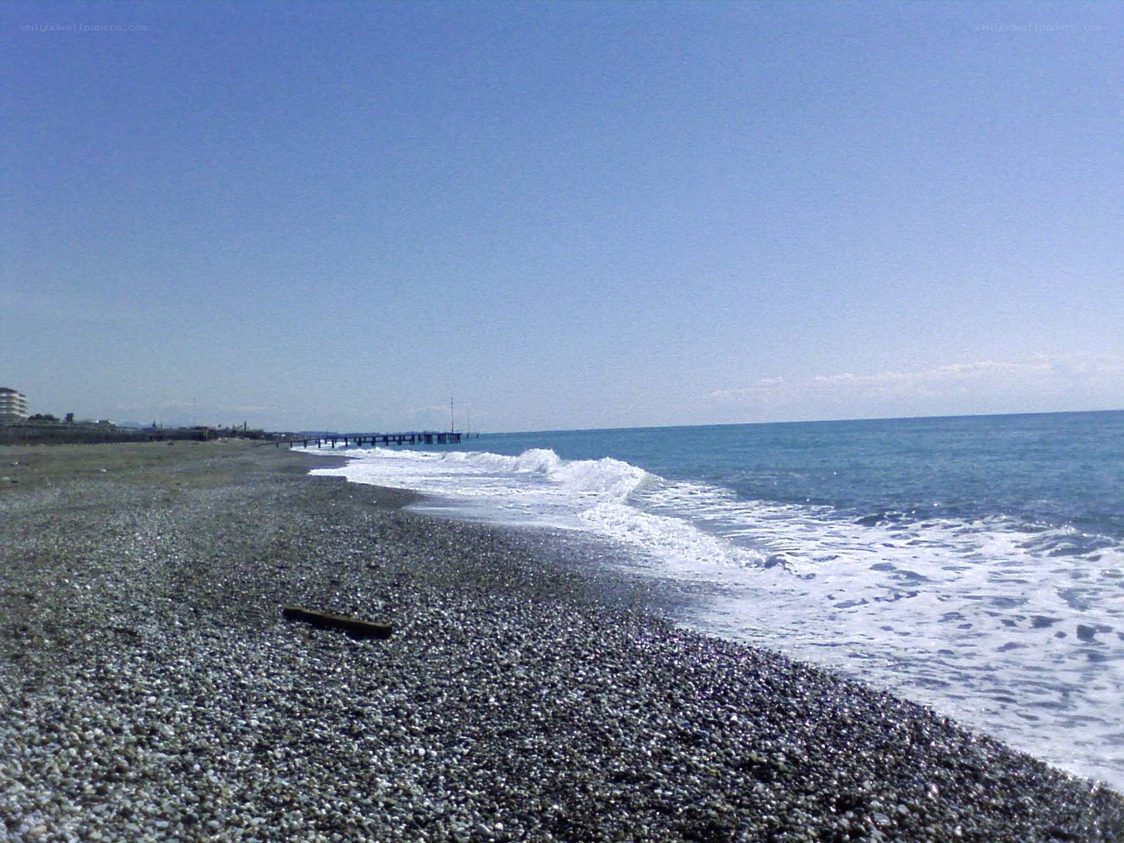 pebble beach with waves