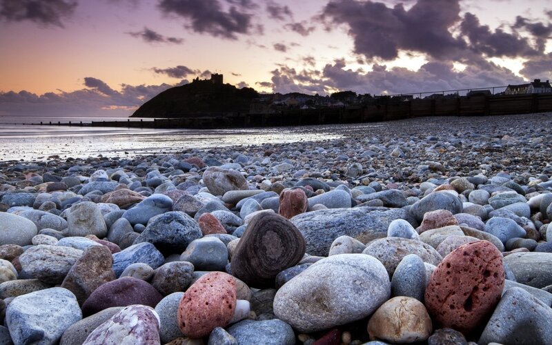 Pebbled Beach at Sunset — Purple, Dramatic