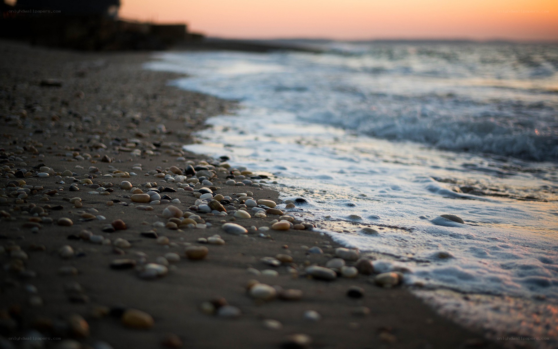 pebbled beach at sunset