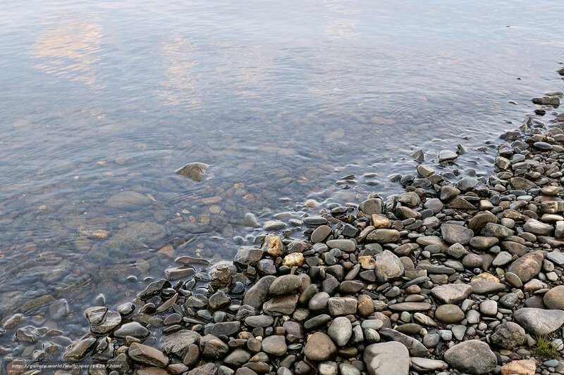 pebbles at the water's edge