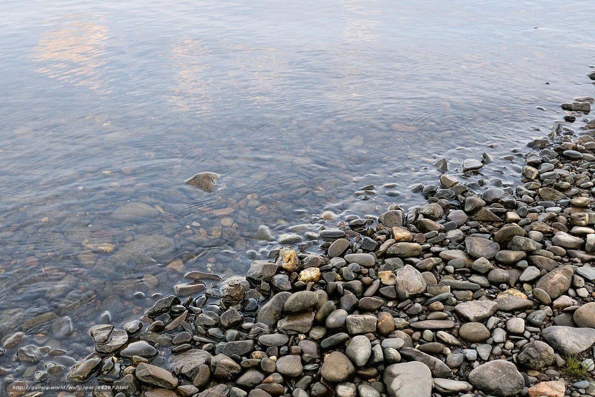 pebbles at the water's edge
