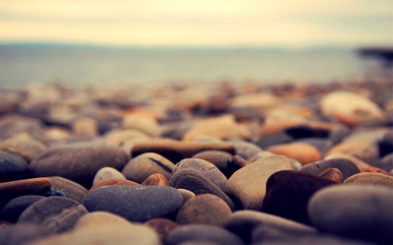 Pebbles on a Beach — Brown, Serene