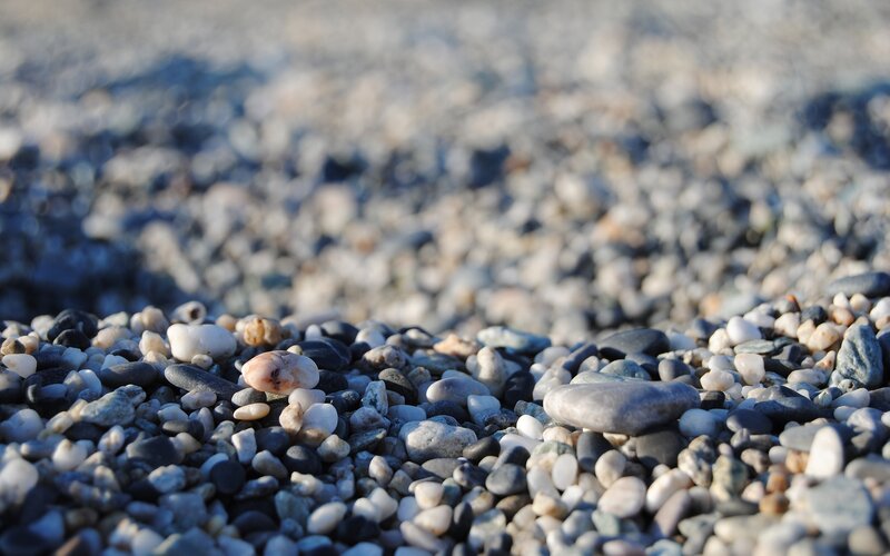 Pebbles on a Beach — Gray, Calm, Afternoon