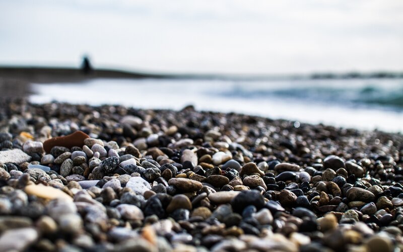 Pebbles on a Beach — Gray, Calm, Photograph, Ocean