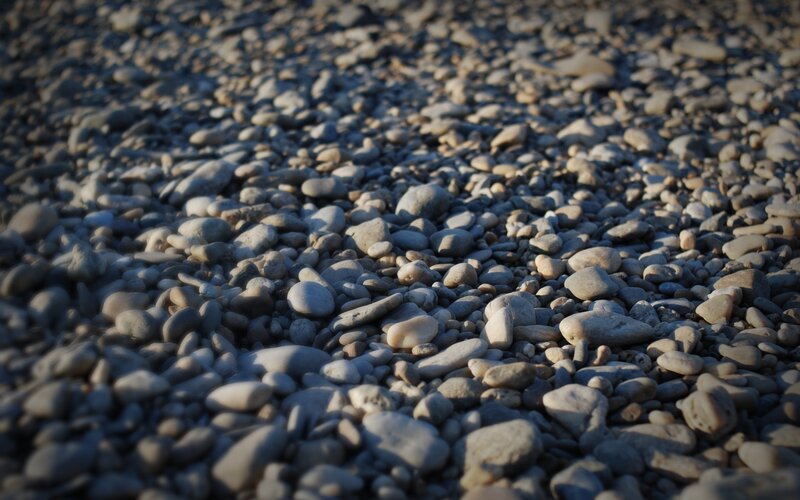 Pebbles on a Beach — Gray, Calm, Sunset, Photograph