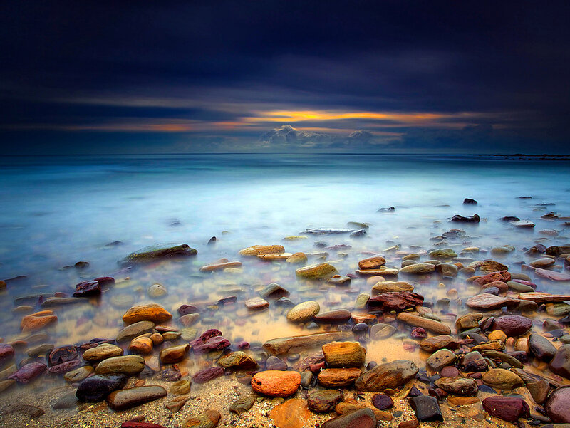Pebbles on Beach at Sunset
