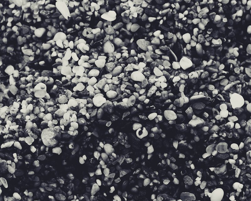 Pebbles on Beach — Black