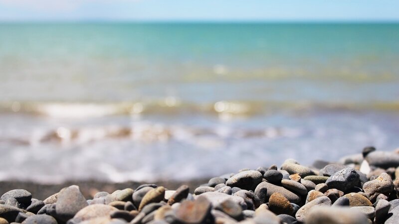 Pebbles on Beach — Blue, Calm, Afternoon, Photograph