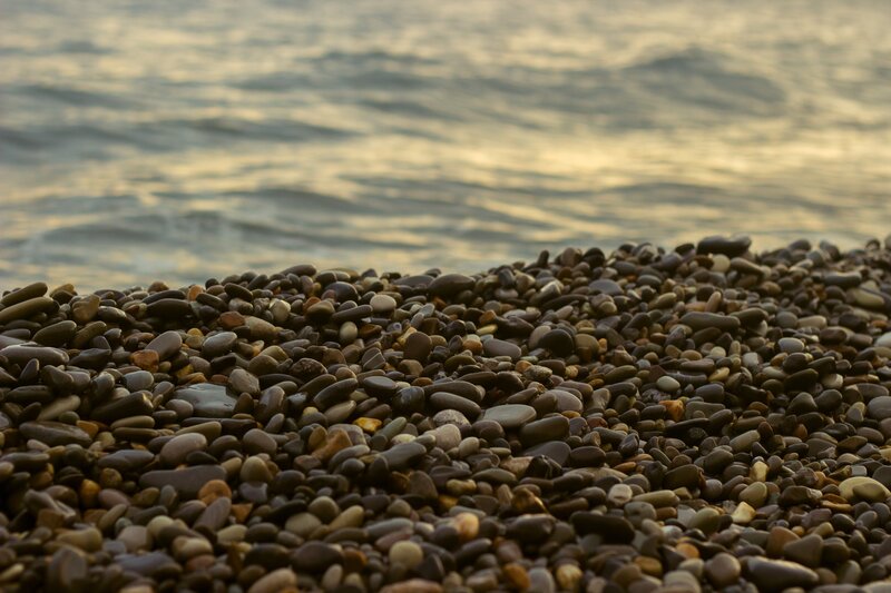 Pebbles on Beach — Brown, Serene, Sunset, Photograph