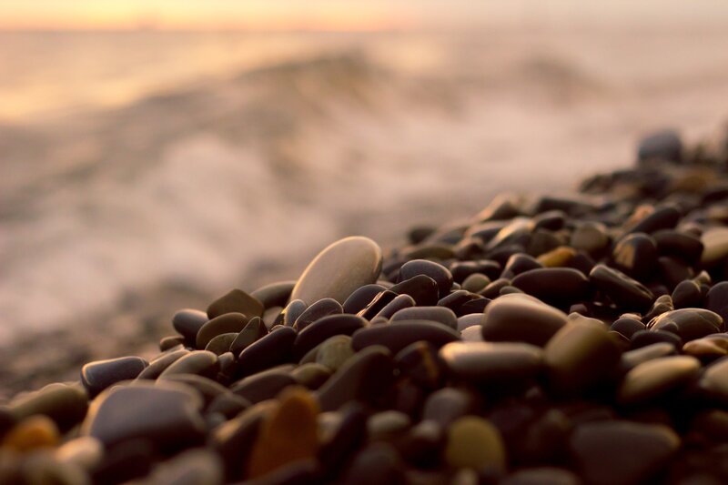 Pebbles on Beach — Brown, Serene, Sunset