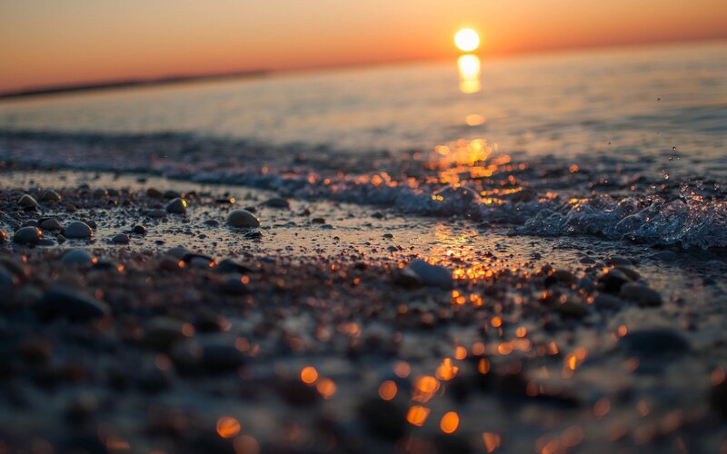 Pebbles on Beach — Orange, Serene, Sunset, Photograph