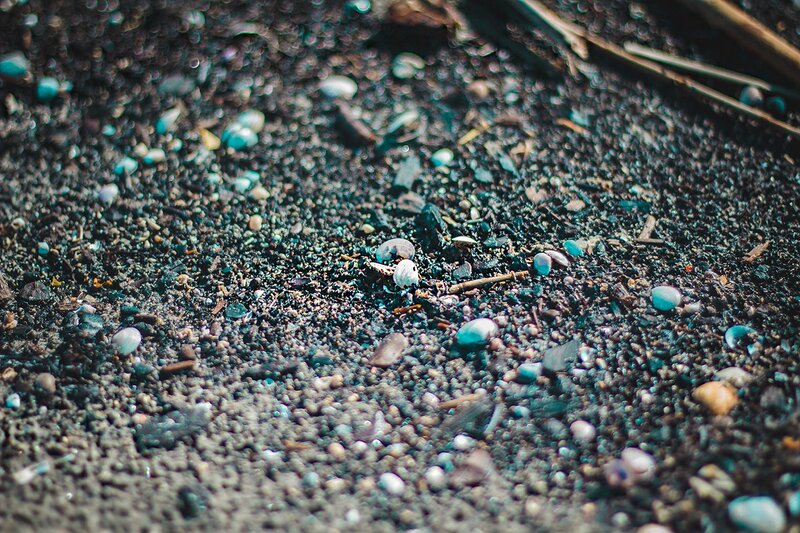 Pebbles on Dark Sand