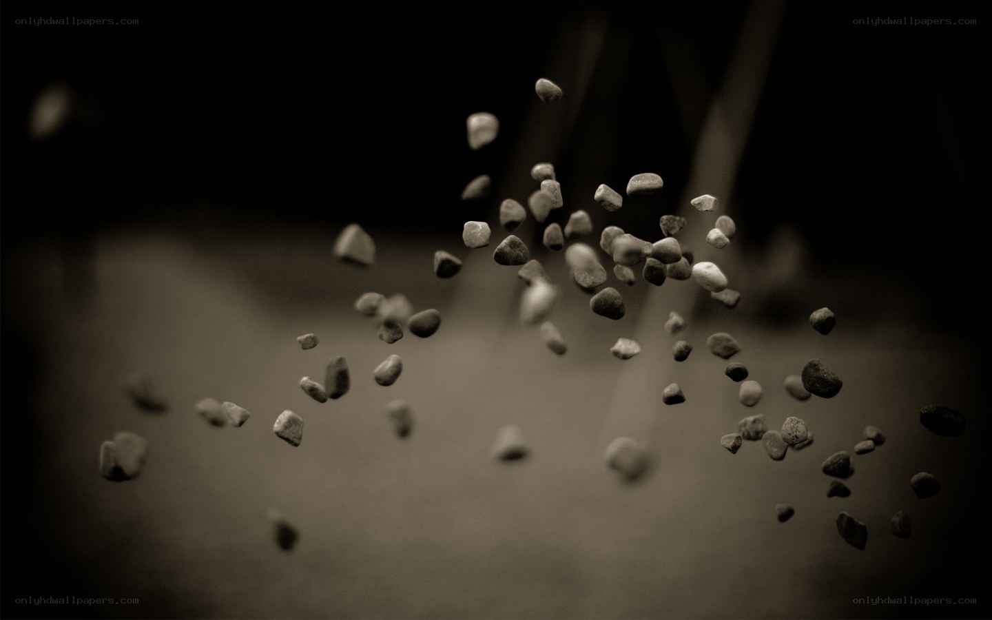 pebbles suspended in air