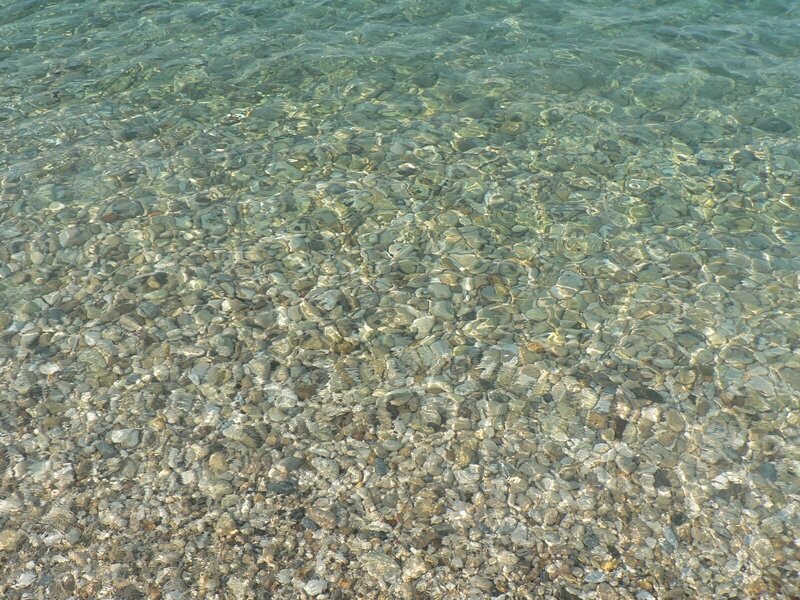 Pebbles under Clear Water — Green
