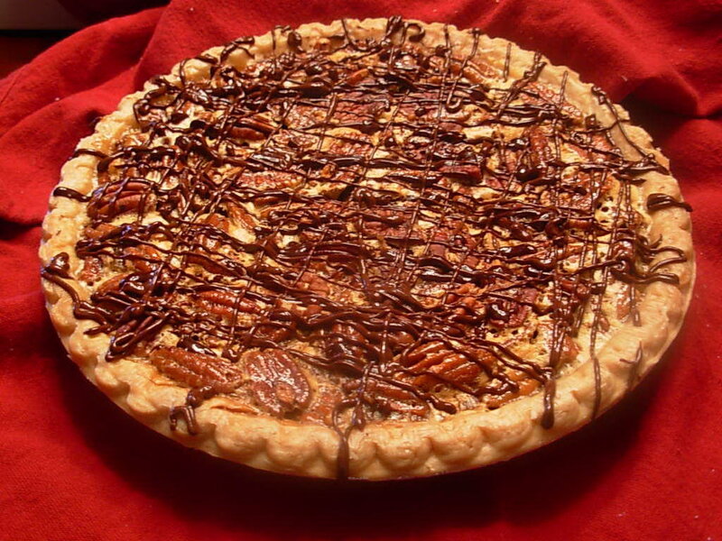 pecan pie with chocolate drizzle