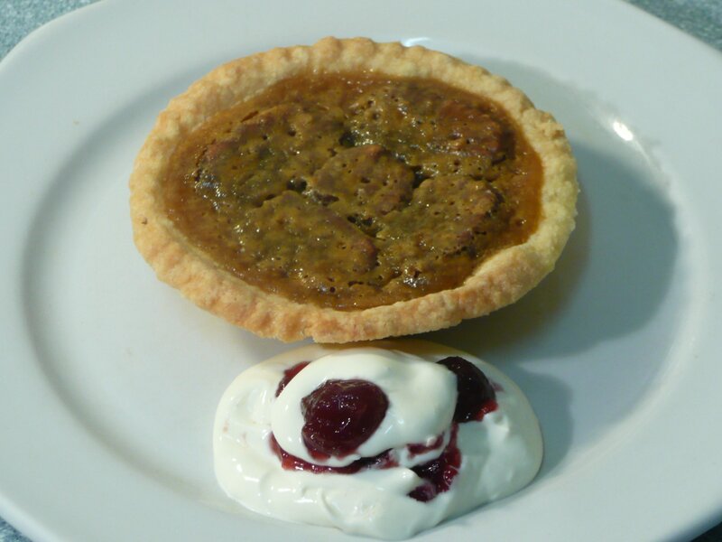 Pecan pie with cream