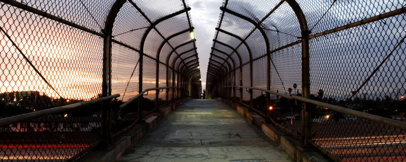pedestrian bridge at sunset