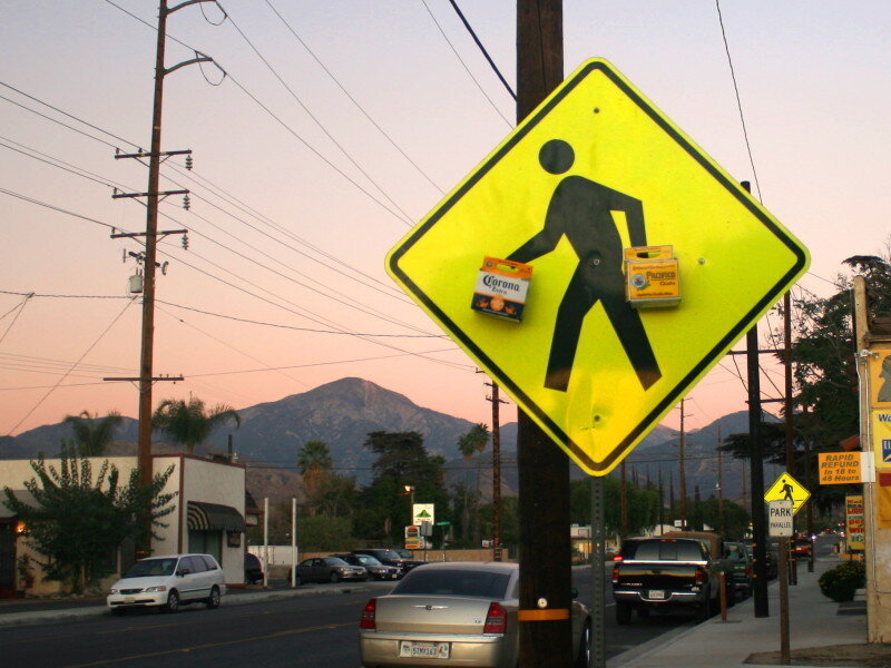 pedestrian crossing sign at dusk