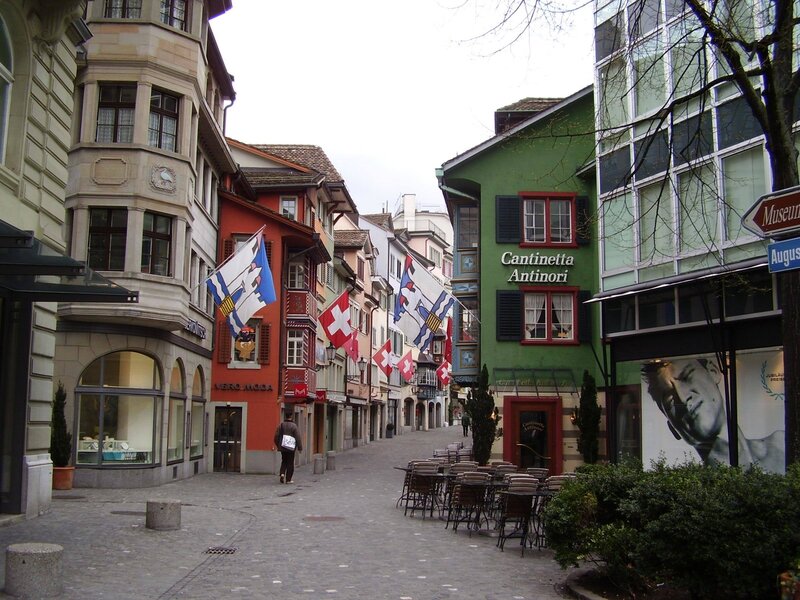 Pedestrian on Cobblestone Street