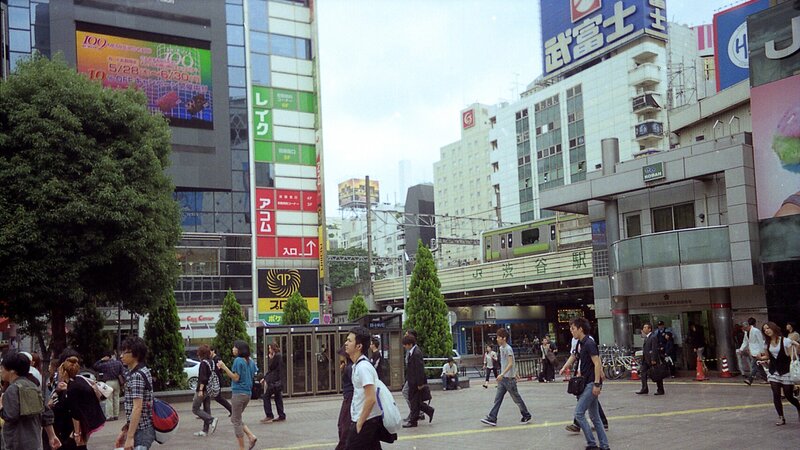 Pedestrians at Train Station