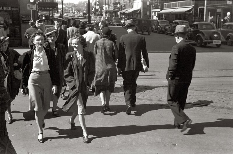 Pedestrians crossing a city street