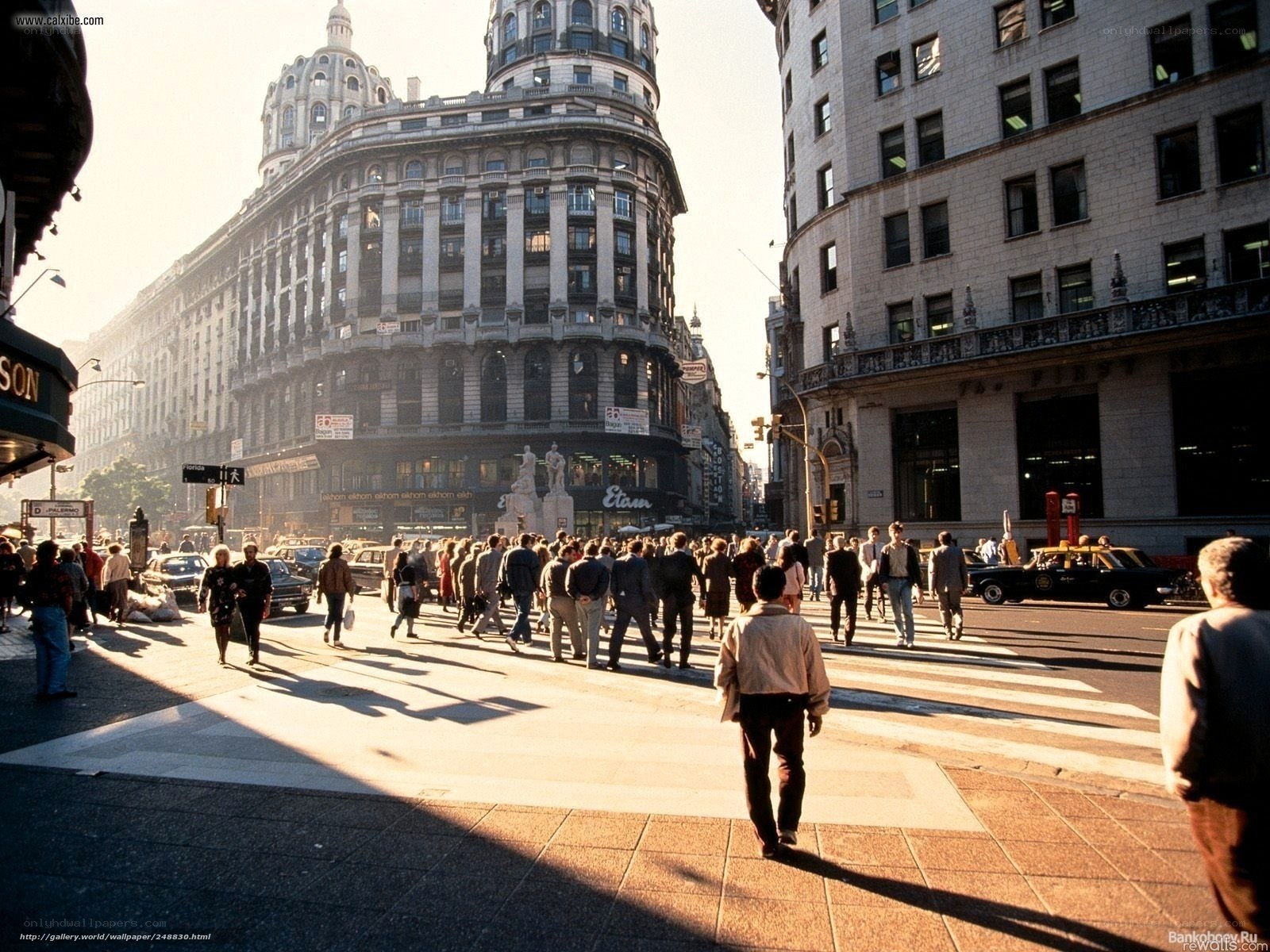 Pedestrians crossing a city street