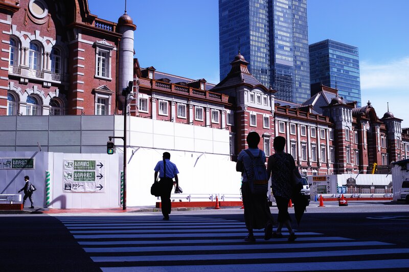 Pedestrians crossing street in Tokyo